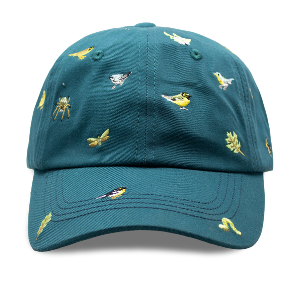 Teal cap with warbler songbirds, leaf and insect patterns on a white background.